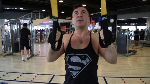 Bodybuilder Doing Heavy Weight Exercise For Triceps Stock Footage 75990910