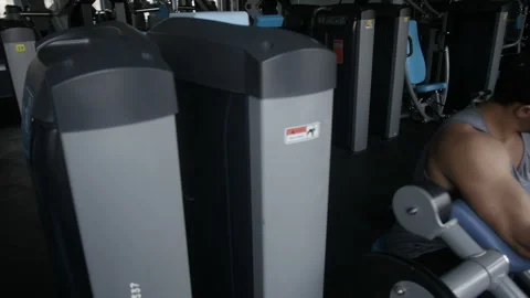 Bodybuilder is doing preacher curl Stock Footage 85614852