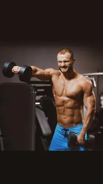 Bodybuilder with dumbbells Foto stock