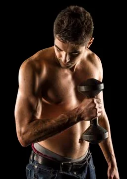 Bodybuilder exercising biceps curl Stock Photos