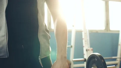 Bodybuilder exercising biceps at gym. Video stock 72025934