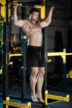 Bodybuilder exercising with weights Stock Photos
