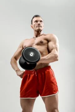 Bodybuilder on grey background Foto stock