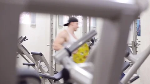 Bodybuilder in the gym Stock Footage 83648675