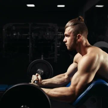 Bodybuilder in the gym Stock Photos