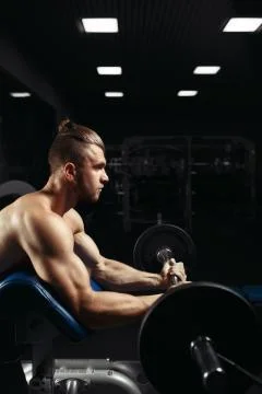 Bodybuilder in the gym Stock Photos