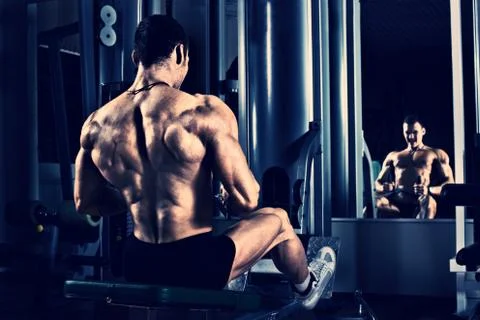 Bodybuilder in gym Stock Photos