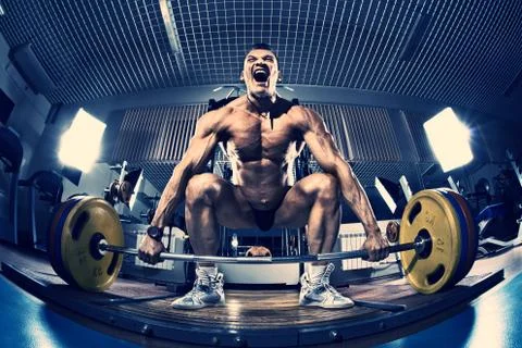 Bodybuilder in gym Stock-Fotos