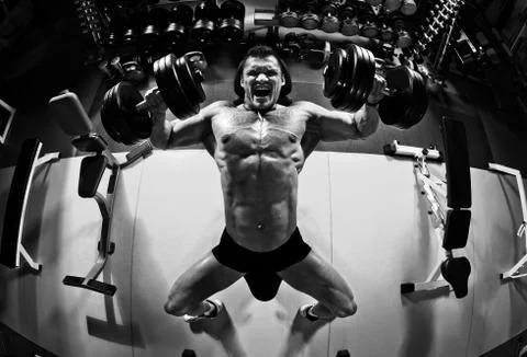 Bodybuilder in gym Stock Photos