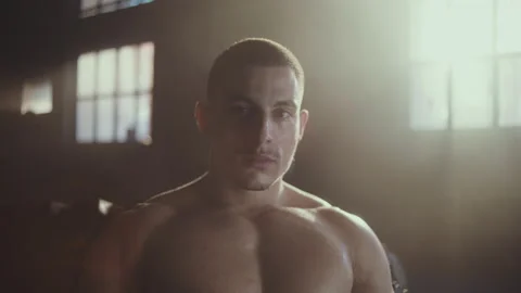 Bodybuilder looking at camera 스톡 동영상 236181635