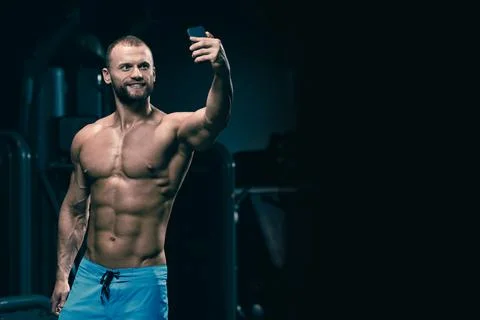 Bodybuilder making selfie Stock Photos