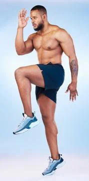 Bodybuilder man, studio and training for running, explosive and balance with Stock Photos