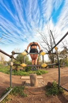 Bodybuilder at parallel bars Stock Photos