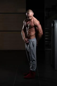 Bodybuilder Performing Side Chest Pose Stock Photos