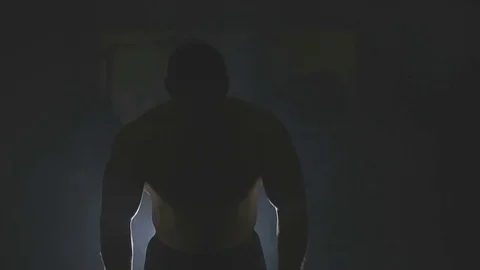 Bodybuilder posing back Stock Footage 73109000