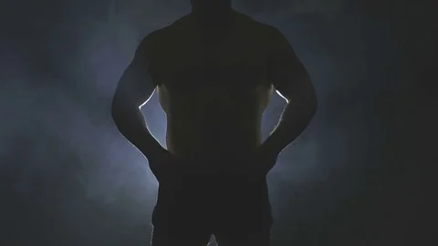 Bodybuilder posing back Stock Footage 73109048
