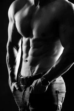 Bodybuilder posing. Handsome power athletic guy male. Fitness muscular body o Stock-Fotos