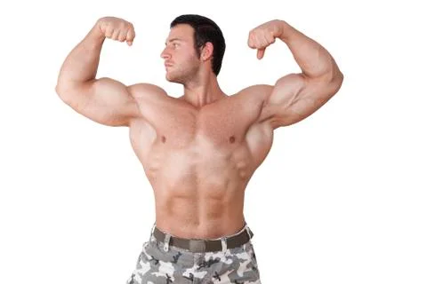 Bodybuilder posing isolated. Stock Photos