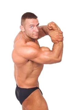 Bodybuilder posing. Stock Photos