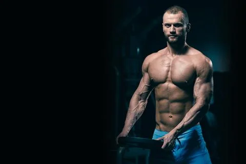 Bodybuilder preparing for weightlifting Stock Photos