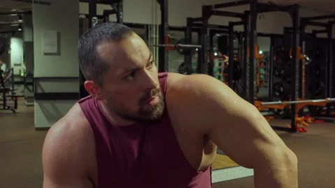 Bodybuilder is resting after workout. Gym,exercise Video stock 194357096