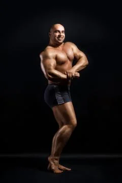 Bodybuilder Topless Over Black Background Stock Photos