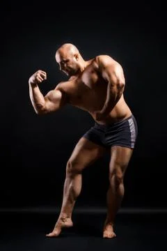 Bodybuilder Topless Over Black Background Stock Photos