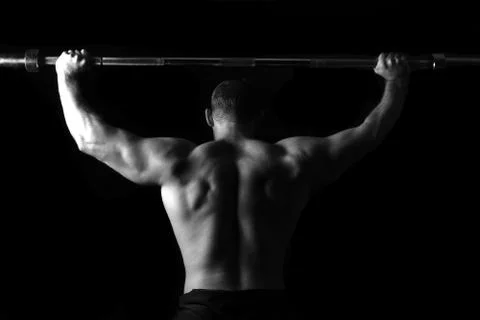 Bodybuilder training in the gym Stock Photos