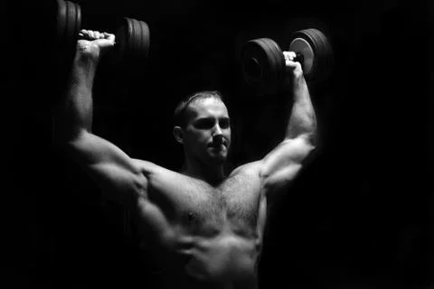Bodybuilder training in the gym Stock Photos