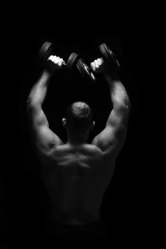 Bodybuilder training in the gym Stock Photos