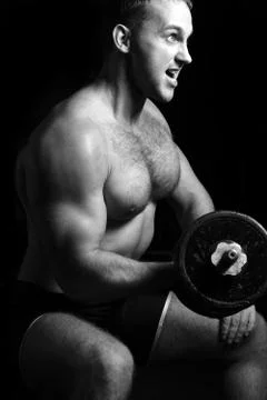 Bodybuilder training in the gym Stock Photos