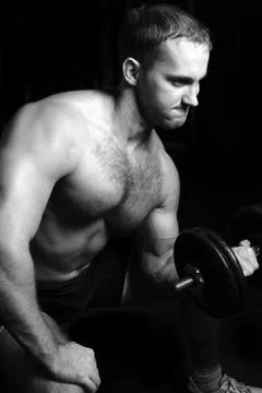 Bodybuilder training in the gym Stock Photos