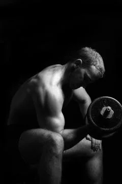 Bodybuilder training in the gym Stock Photos