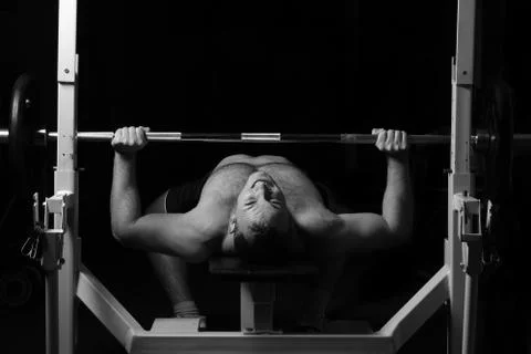 Bodybuilder training in the gym Stock Photos