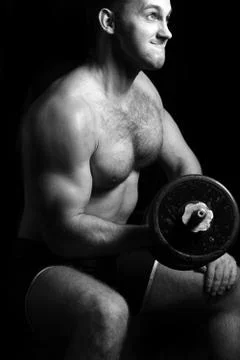 Bodybuilder training in the gym Stock Photos