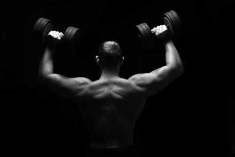 Bodybuilder training in the gym Stock Photos