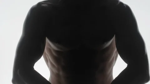 Bodybuilder on white background Video stock 128346743