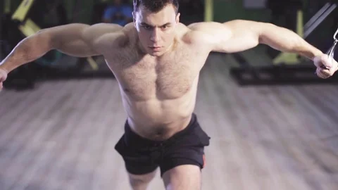Bodybuilder Is Working On His Chest With Cable Crossover In Gym Stock Footage 81054628