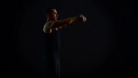 Bodybuilder Working Out, Front Dumbbel Raise, 4K Video Stock Footage 73049521