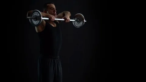 Bodybuilder Working Out, Upright Barbell Row, 4K Video Stock Footage 73052065