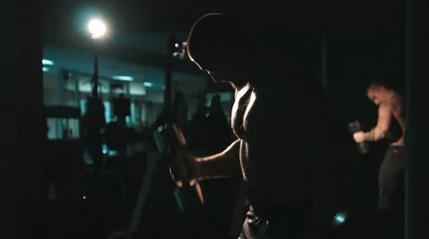 Bodybuilder workout with weight ,exercise biceps curls at gym , lowlight 스톡 동영상 68414668