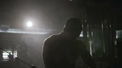 Bodybuilding exercise on the back and quadriceps Stock Footage 93256751