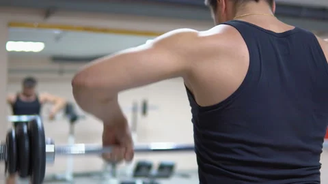 Bodybuilding. Thrust rod to the chin. Video stock 91044752