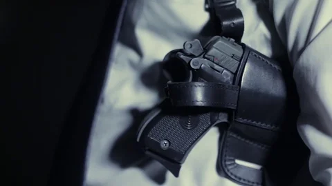 Bodyguard aiming close up Stock Footage 80990137