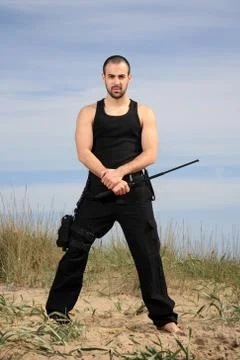 Bodyguard in the sand Stock Photos