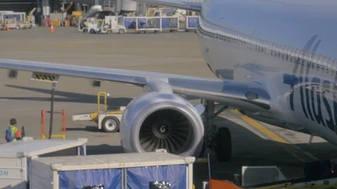 Boeing 737 engine and wing on Alaska Airline plane. Stock Footage