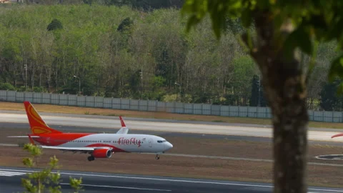 Boeing 737 of FireFly landing at Phuket Stock Footage 334247779