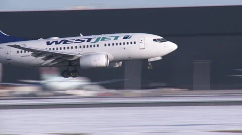 Boeing 737 Landing in Winter Stock Footage 36033580