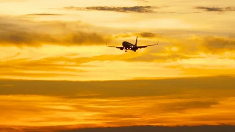 Boeing 737 in the light of the sunset Stock Footage 94676617