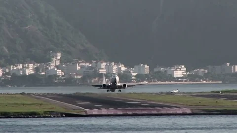 Boeing 737 taking off from Santos Dumont Stock-Footage 77679366